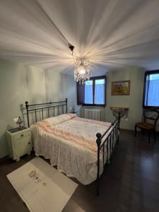 Postel nebo postele na pokoji v ubytování Casa Reggiaio