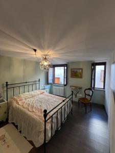 Postel nebo postele na pokoji v ubytování Casa Reggiaio