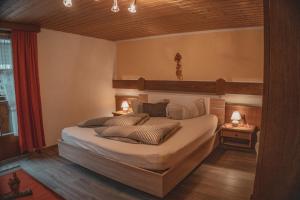 Postel nebo postele na pokoji v ubytování Haus Bergwind