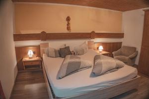 Postel nebo postele na pokoji v ubytování Haus Bergwind