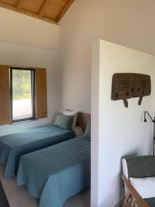 Postel nebo postele na pokoji v ubytování B&B Quinta a Fonte Tavira - Adults Only