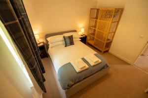 Postel nebo postele na pokoji v ubytování 5 Glenloch View