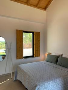 Postel nebo postele na pokoji v ubytování B&B Quinta a Fonte Tavira - Adults Only