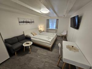 Voodi või voodid majutusasutuse Hotel Surselva toas