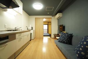 Kuchyň nebo kuchyňský kout v ubytování Guest House 伏見稲荷