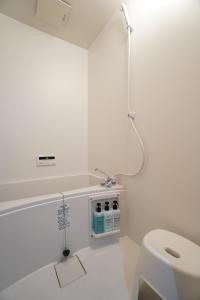 Koupelna v ubytování Guest House 伏見稲荷