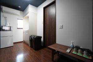 Kuchyň nebo kuchyňský kout v ubytování Guest House 伏見稲荷