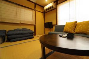 Posezení v ubytování Guest House 伏見稲荷