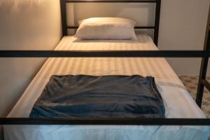 Postel nebo postele na pokoji v ubytování Closca Hostel Koh Tao