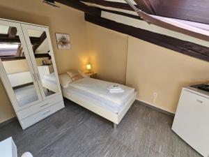 Voodi või voodid majutusasutuse Hotel Surselva toas