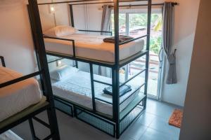 Postel nebo postele na pokoji v ubytování Closca Hostel Koh Tao