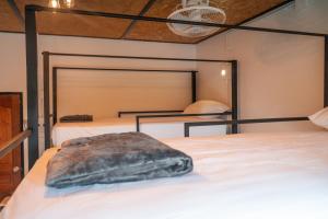 Postel nebo postele na pokoji v ubytování Closca Hostel Koh Tao