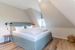 Letto o letti in una camera di Einzelhaus Huus Elphi Huus Elphi