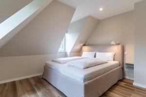 Letto o letti in una camera di Einzelhaus Huus Elphi Huus Elphi