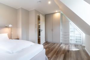 Letto o letti in una camera di Einzelhaus Huus Elphi Huus Elphi