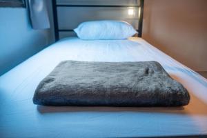 Postel nebo postele na pokoji v ubytování Closca Hostel Koh Tao
