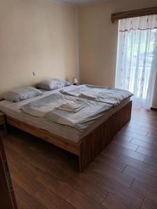 Postel nebo postele na pokoji v ubytování Posestvo Rožengrunt pri Miheliču