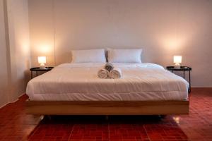 Postel nebo postele na pokoji v ubytování Closca Hostel Koh Tao
