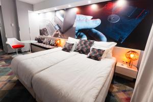 Postel nebo postele na pokoji v ubytování Science Hotel Prémium + 37 fotografií