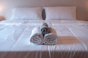 Postel nebo postele na pokoji v ubytování Closca Hostel Koh Tao