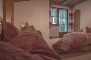 Postel nebo postele na pokoji v ubytování Haus Bergwind
