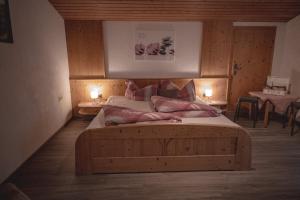 Postel nebo postele na pokoji v ubytování Haus Bergwind