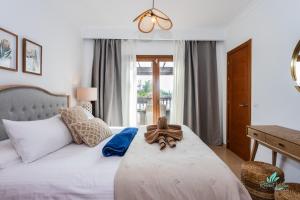 Postel nebo postele na pokoji v ubytování Casa Familia