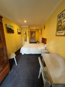 Postel nebo postele na pokoji v ubytování Hotel Vidal