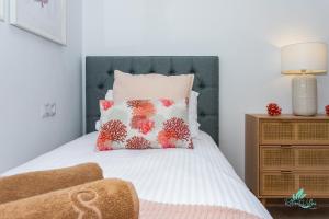 Postel nebo postele na pokoji v ubytování Casa Familia