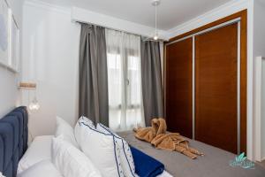 Postel nebo postele na pokoji v ubytování Casa Familia
