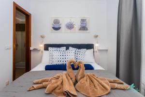 Postel nebo postele na pokoji v ubytování Casa Familia