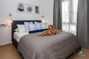 Postel nebo postele na pokoji v ubytování Casa Familia