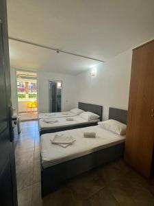 Postel nebo postele na pokoji v ubytování Hotel OBELISC