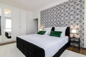 Katil atau katil-katil dalam bilik di Highlife Apartment One Wiesbaden Wilhelmstraße