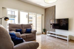 Μια τηλεόραση ή/και κέντρο ψυχαγωγίας στο Lanzas apartment with AC and wifi