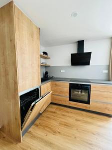 Kuchyň nebo kuchyňský kout v ubytování Apartma Neja