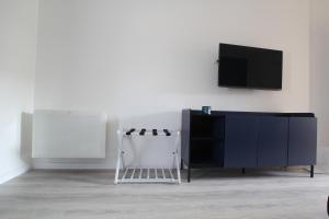 TV a/nebo společenská místnost v ubytování Villa Capodacqua