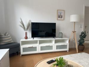 TV a/nebo společenská místnost v ubytování Küstenbude Strandbude