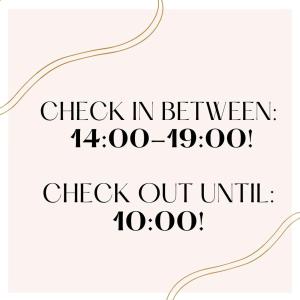 a sign with the words check in between out at Promenade Panzi&oacute; in Miskolc