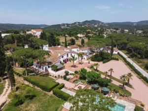 an aerial view of a house with a garden at Casa Mirador in Tordera