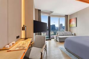 成都领地希尔顿嘉悦里酒店（亚太首家，Canopy by Hilton）的电视和/或娱乐中心