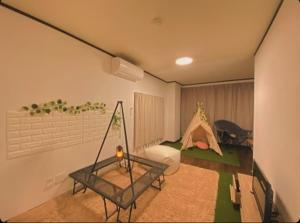 A bed or beds in a room at THE MOON Atami