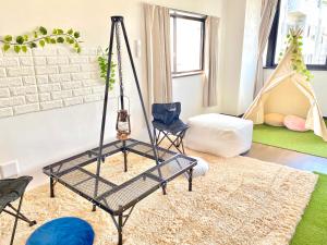 A bed or beds in a room at THE MOON Atami