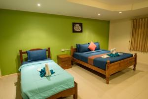 Lareena Resort Koh Larn Pattayaにあるベッド