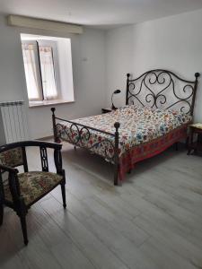 Postel nebo postele na pokoji v ubytování A casa di Luigi