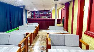 Un lugar para sentarse en Hello Inn Guest House & Apartment