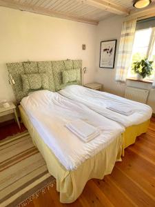 Postel nebo postele na pokoji v ubytování Adagio på Österlen
