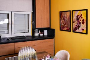 Kuchyň nebo kuchyňský kout v ubytování TEN Guest House + 37 fotografií