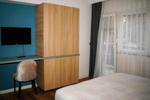 Postel nebo postele na pokoji v ubytování TEN Guest House