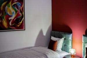 Postel nebo postele na pokoji v ubytování TEN Guest House